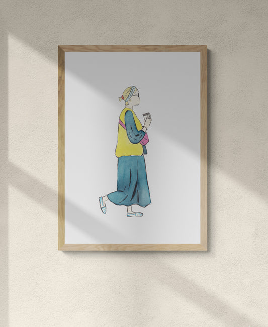 Framed artwork of a girl walking with coffee in hand in a cute spring outfit of long denim dress with yellow vest pink bag and white and blue shoes with blue headband and orange scrunchie