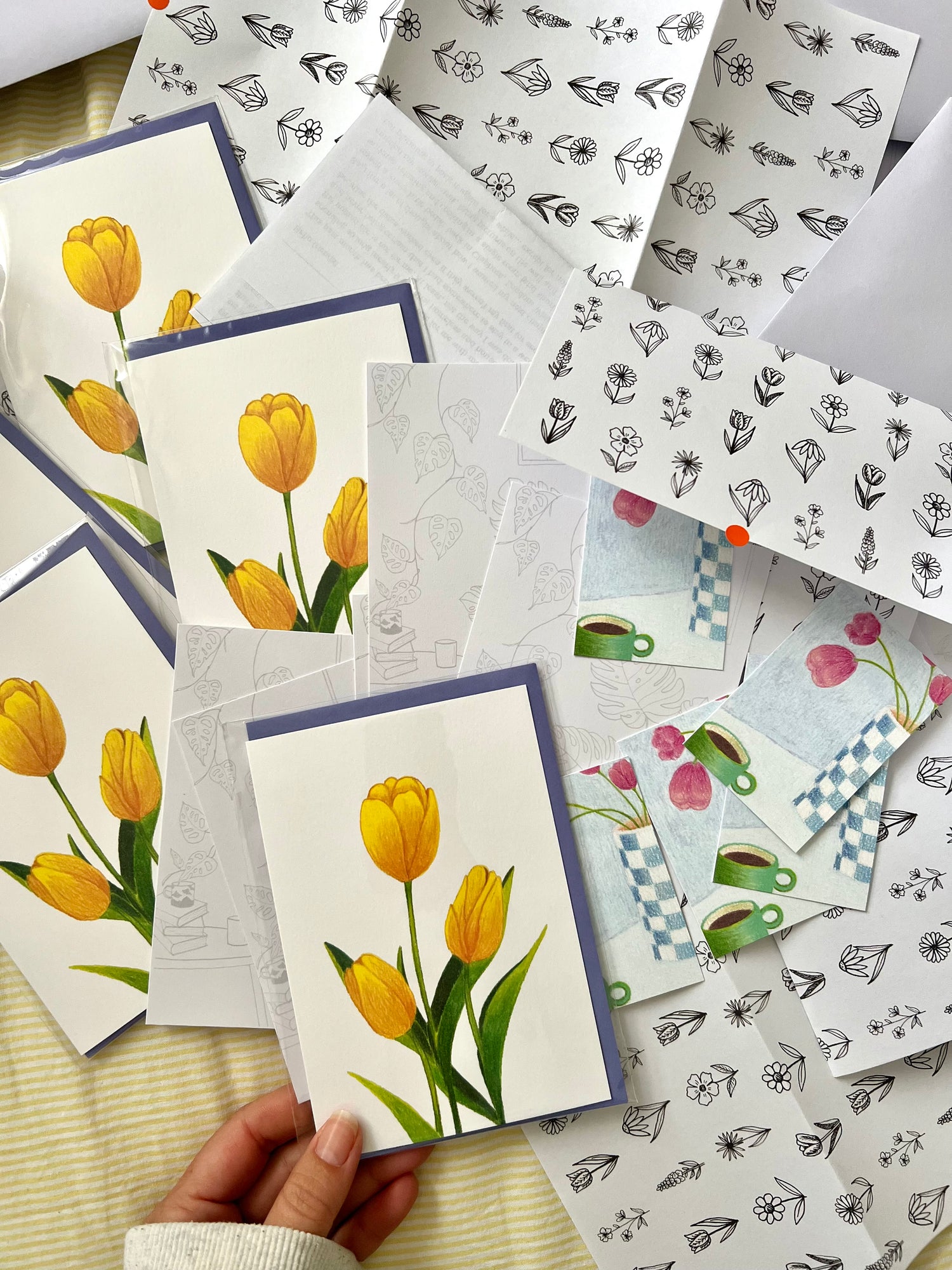 Collection of the May card with extras like mini print, mystery item, letter and wrapping